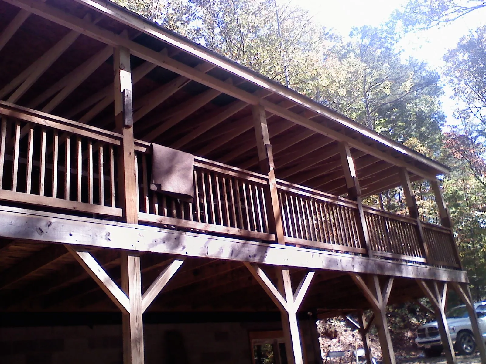Timber framing under a new elevated porch and deck — Roof Leak Repair in Bixby by Roofing Brothers